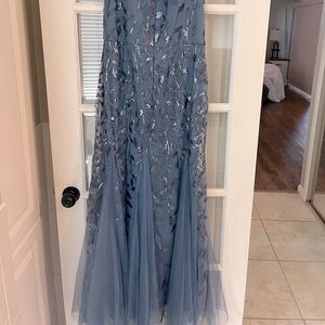 Brand new with tags.  Decided on a different dress.  My loss your gain.